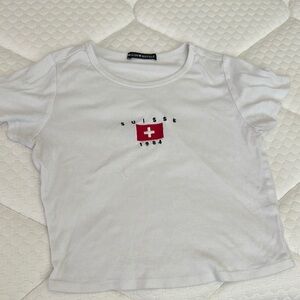 Brandy Melville White Suisse 1984 baby Tee